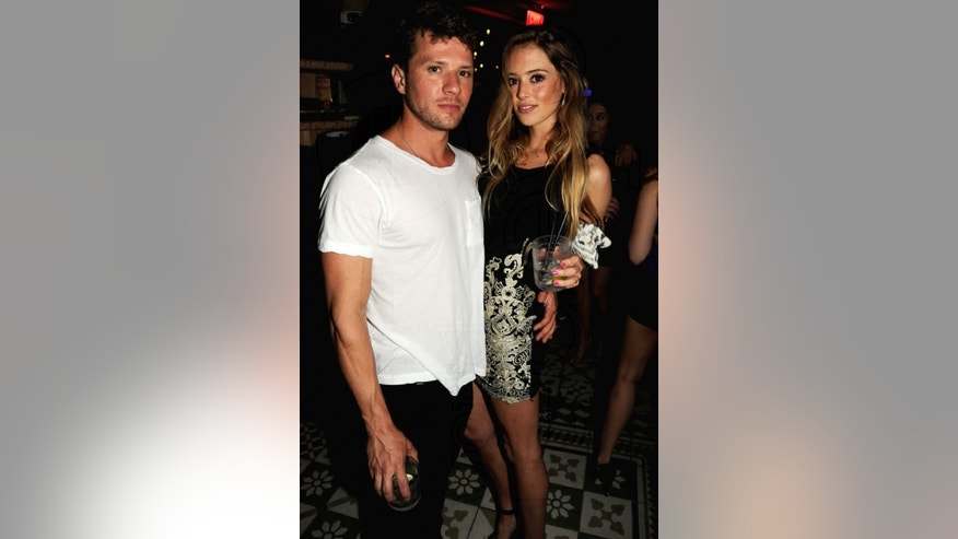 Ryan-Phillippe-Paulina-Slagter handout.jpg
